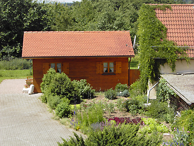 Gasthof Zum Doppeladler - Garten mit Blockhaus
